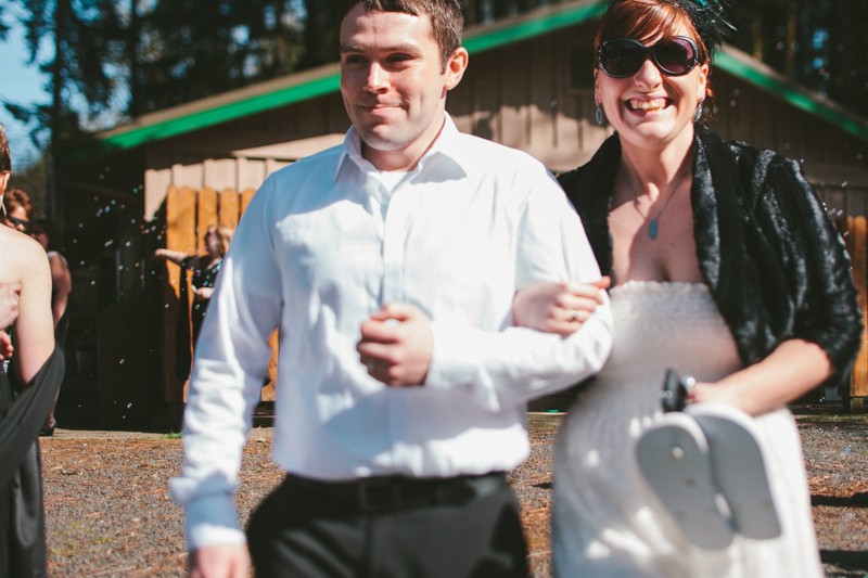 bride and groom exit with bubbles