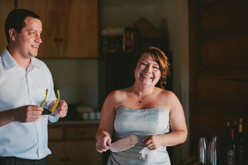 Bride and groom laughing. 