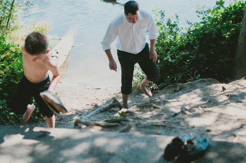 A fun moment in the lake at a summery Island Lake Park wedding. 