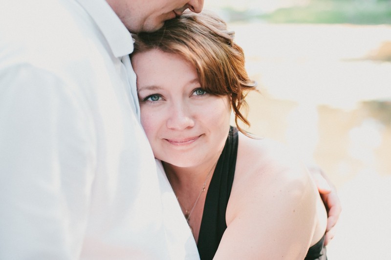 Bride hugging her groom at their outdoor wedding at Island Lake Park in Silverdale. 