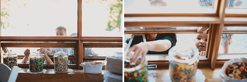 Children sneaking from candy jars through a window. 