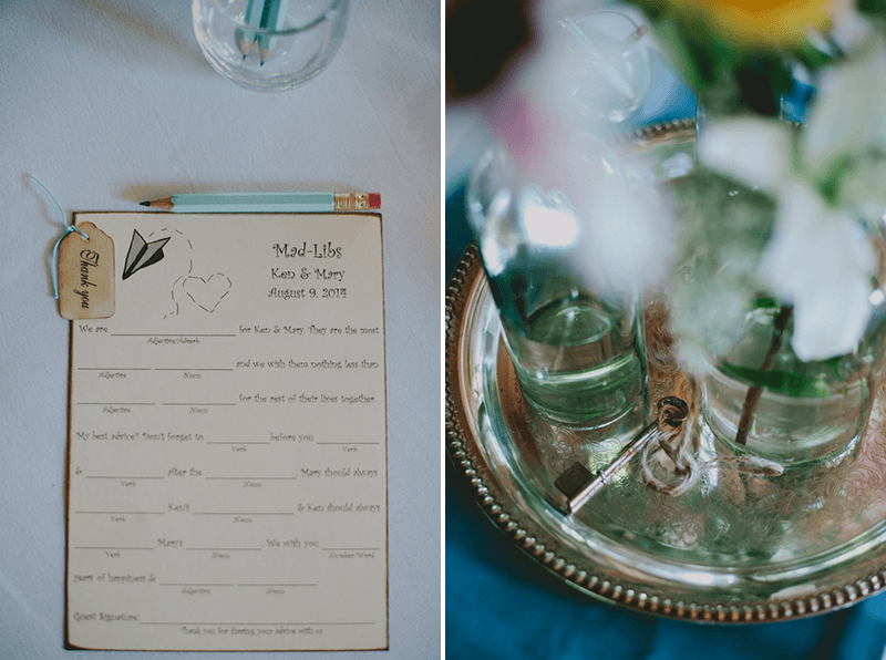 Vintage wedding centerpiece with a silver platter and a skeleton key, and personalized wedding mad libs. 