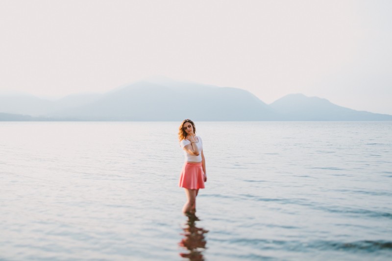 Hood Canal high school senior session, with girl standing in water. 