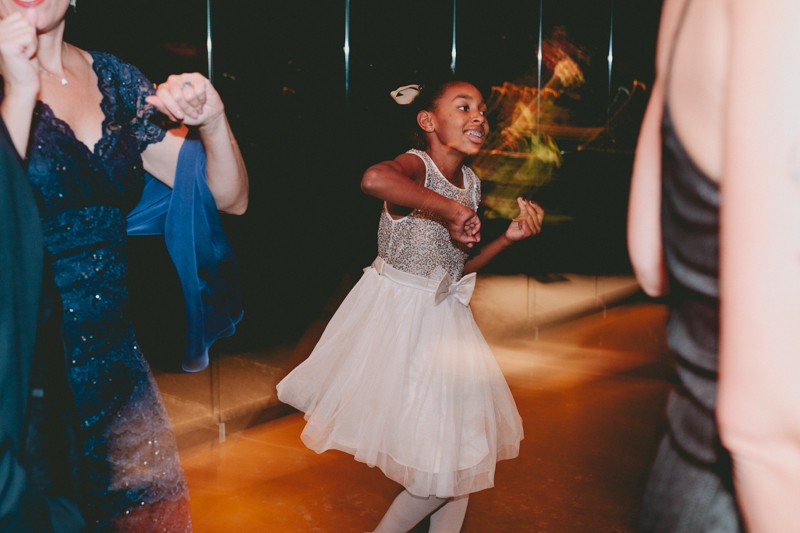 Little girl dancing at a wedding. 