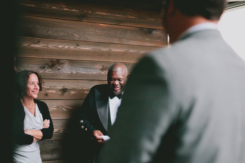 Groom laughing before wedding ceremony. 