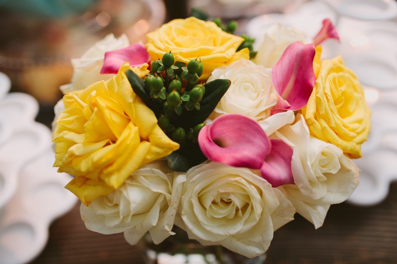 White, pink and yellow bridal bouquet with Roses and Calla Lilies