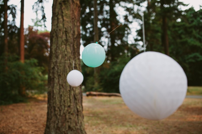 Simple blue and white balloon garland for a park wedding. 