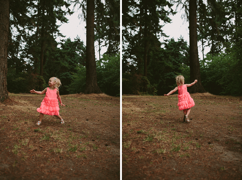 Little girl in a pink dress dancing, at Lincoln Park in Seattle. 