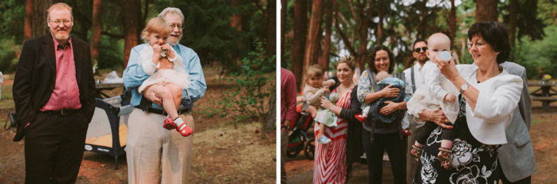 Grandparents hold bride and groom's daughters during wedding ceremony. 