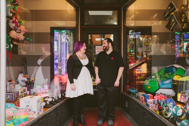 Non-traditional engagement session at Quarters Arcade in Bremerton, with bride with purple hair. 