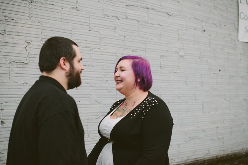 Cute alternative, tattooed engaged couple in downtown Bremerton. 