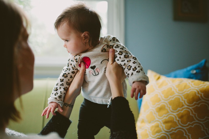 Adorable baby girl wearing a leopard print kitty cat sweater. 