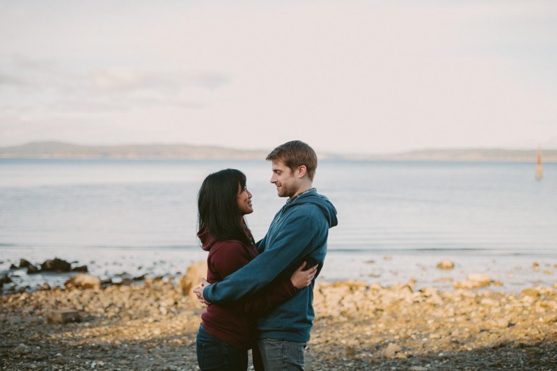 Fun and relaxed couples' portrait session, on a rocky beach in Kitsap County, WA. 