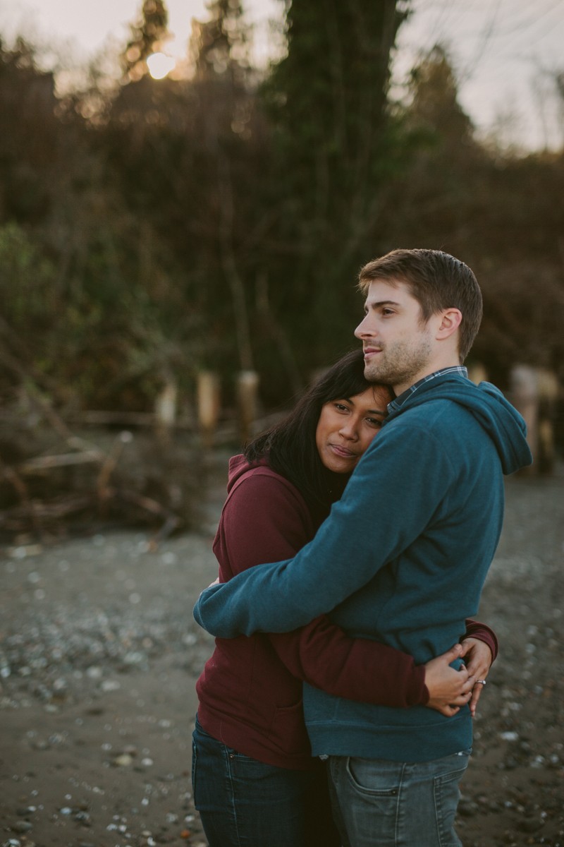 Bremerton portrait photography session, with cute couple hugging on the beach. 