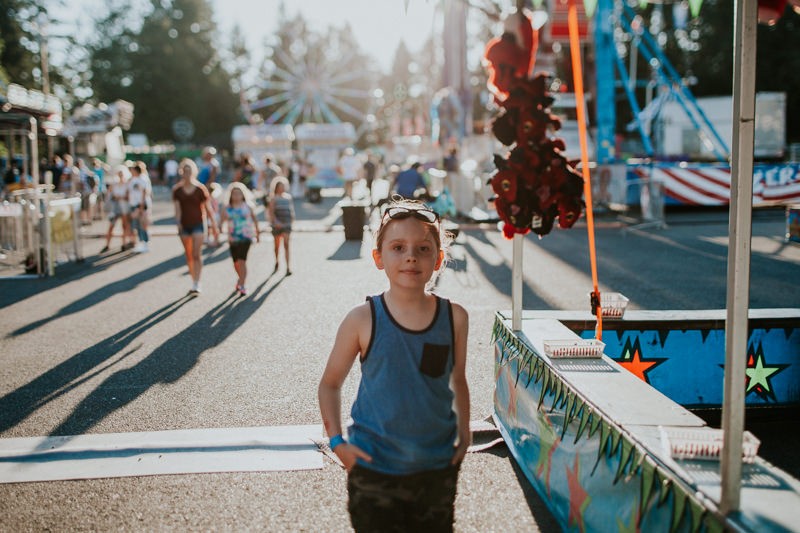 Lifestyle portraits at the county fair in summer. 