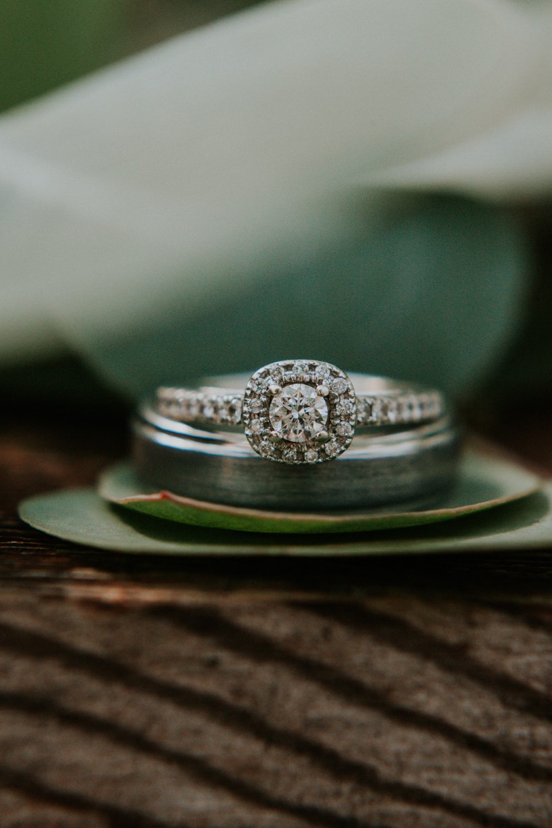 Gorgeous Diamond engagement ring with halo and pave band, with titanium groom's ring.