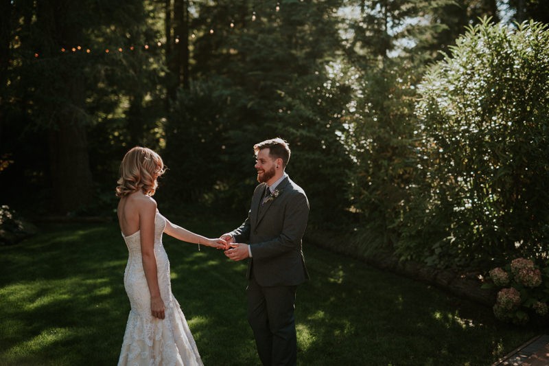 Bride and groom's first look at Black Diamond Gardens in Washington State. 