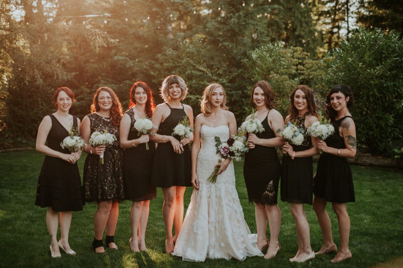 Garden glam bride and bridesmaids, holding Dahlia bouquets. 