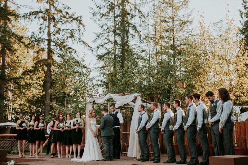 Outdoor summer wedding ceremony at Black Diamond Gardens. 