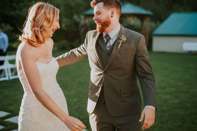 Fun ceremony recessional with bride and groom dancing to music. 