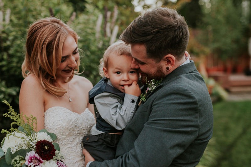 Bride, Groom and their son, at Black Diamond Gardens. 