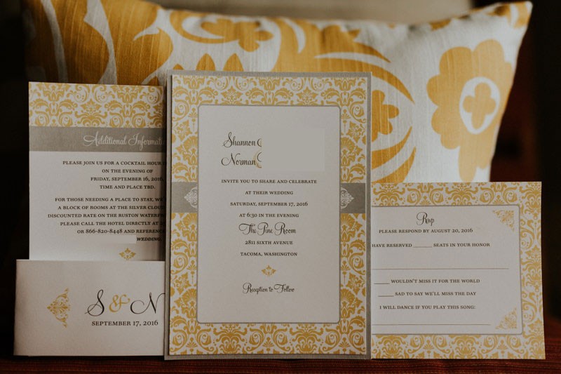 Modern yellow and grey damask print invitation suite. 