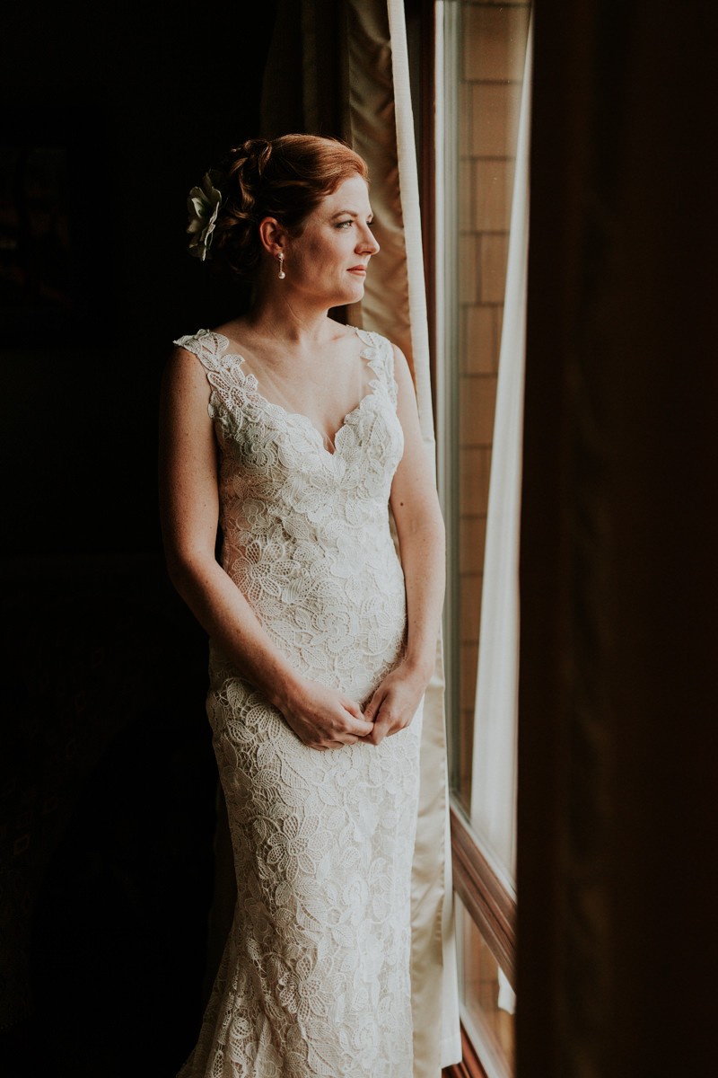 Beautiful bride wearing a sweetheart neckline dress and classic up-do hairstyle. 