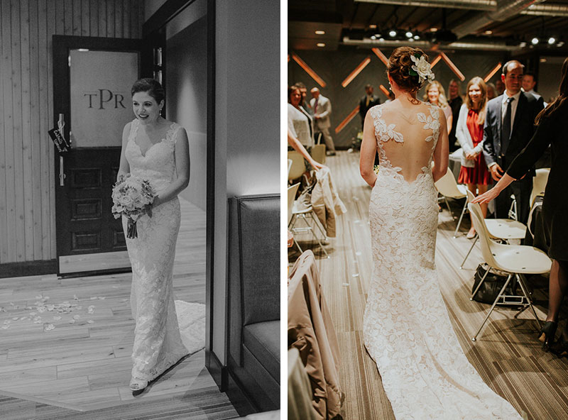 Bride walks down the aisle, wearing a gorgeous illusion back wedding gown with a train. 