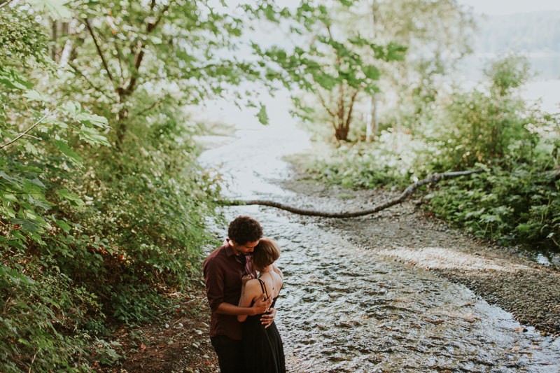 Romantic moment in the woods near a creek, at Twanoh State Park in Union, WA. 