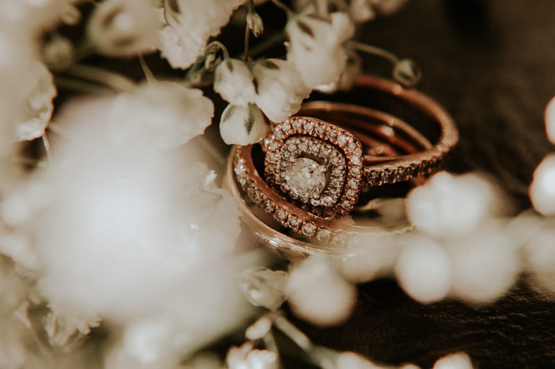 Vintage-inspired wedding ring set, with pave band and double halo engagement ring. 