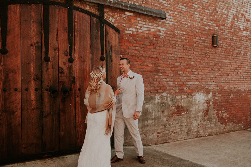 Sweet first look moment in Port Townsend, WA for a winter elopement. 