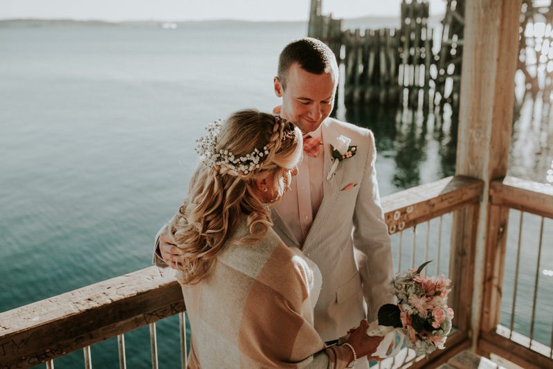 Sweet Port Townsend elopement, with bride wearing a braided half up-do with Baby's Breath. 