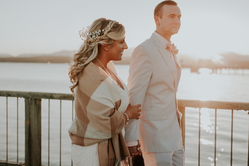 Non-traditional waterfront elopement at sunset in Port Townsend, Washington.