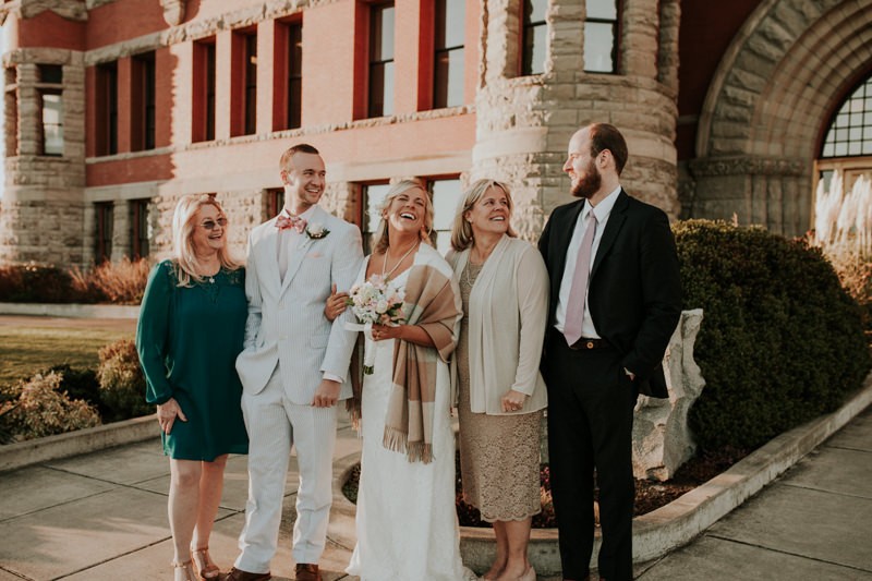 Sunny courthouse elopement with just a few family members. 