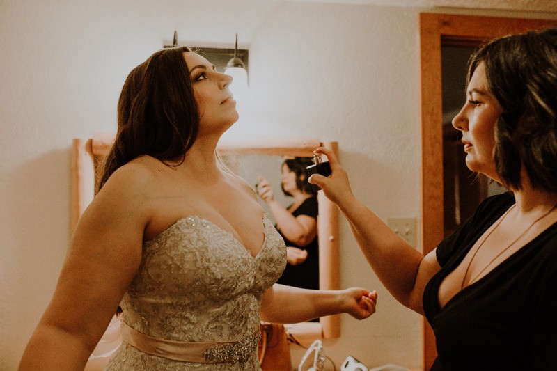 Bride getting ready with friend at Kitsap Memorial State Park | Seattle wedding + elopement photographer Meghann Prouse | www.photomegs.com