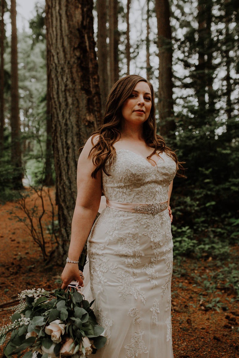 Romantic forest bride in a strapless sweetheart gown with blush sash | Poulsbo wedding + elopement photographer Meghann Prouse | www.photomegs.com