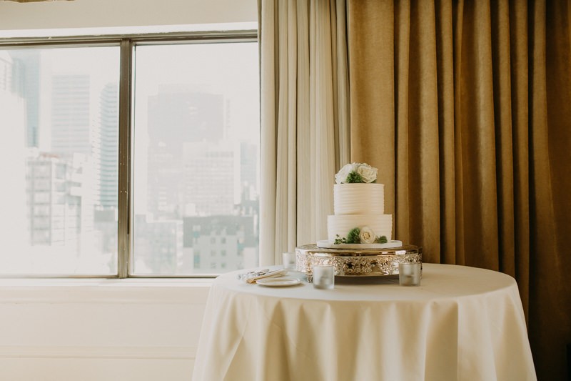 Rooftop wedding details with white cake at The Hotel Sorrento | Seattle wedding + elopement photographer Meghann Prouse | www.photomegs.com