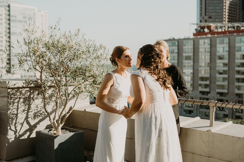 Same sex rooftop wedding in Downtown Seattle | PNW wedding + elopement photographer Meghann Prouse | www.photomegs.com
