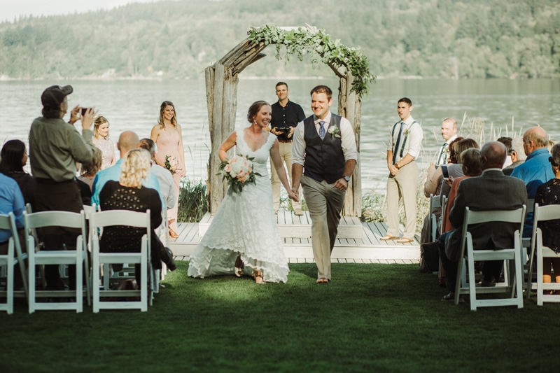Intimate beach wedding recessional at The Edgewater House in Olalla, WA | Orcas Island wedding photographer Meghann Prouse | www.photomegs.com