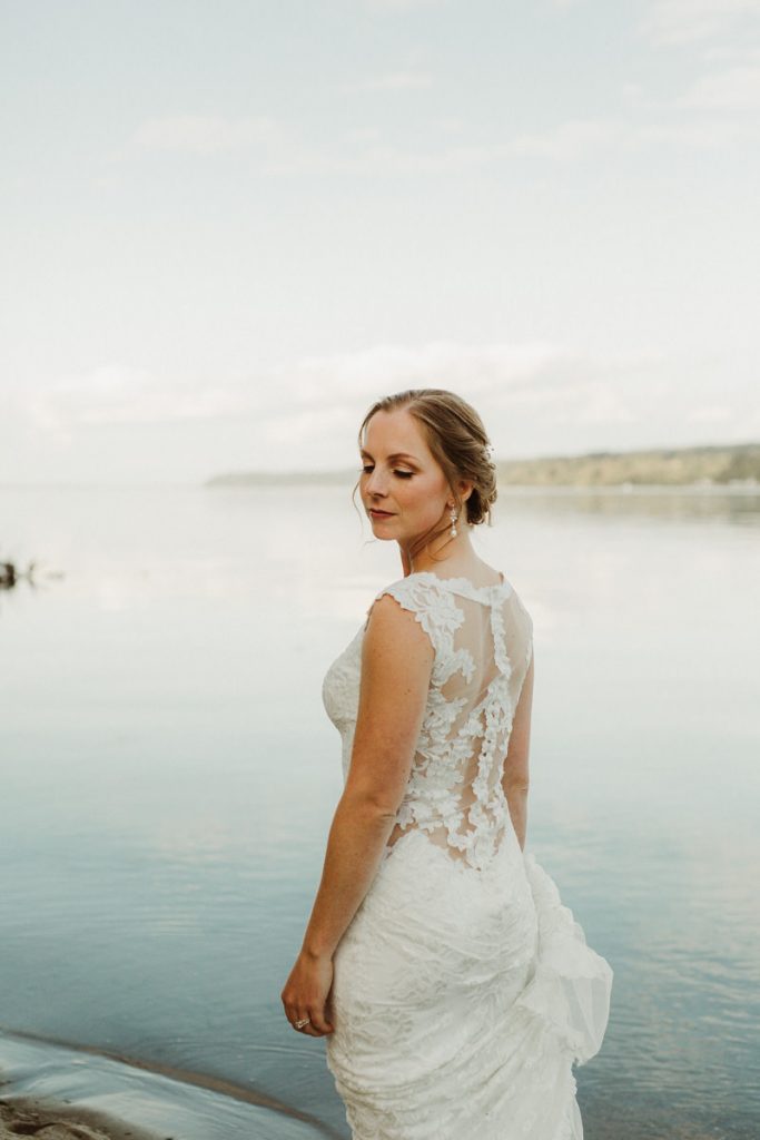 Bride in gorgeous lace wedding dress with plunging illusion back | PNW wedding + elopement photographer Meghann Prouse | www.photomegs.com