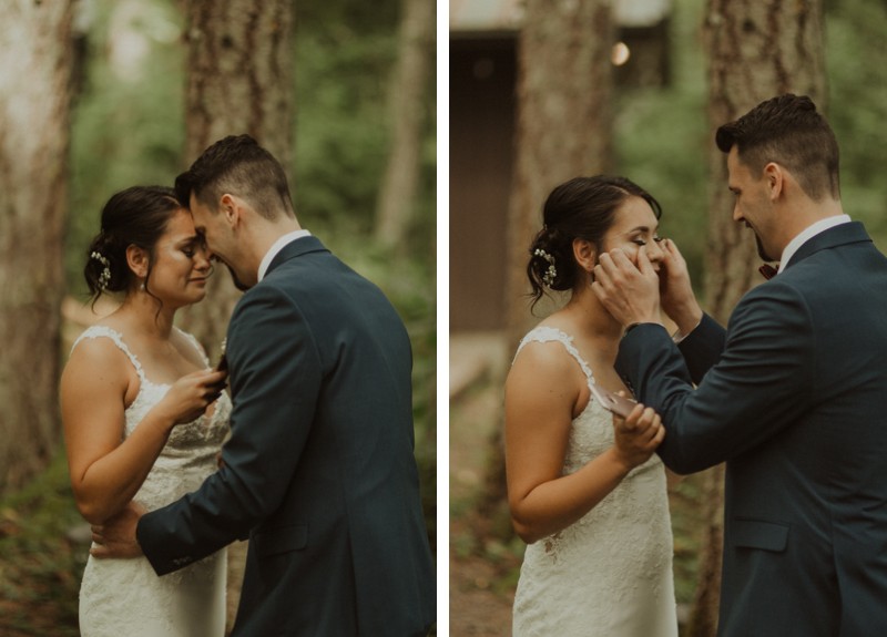 Groom wiping tears from bride's eyes during first look vows | Northwest Trek wedding day | PNW wedding photographer
