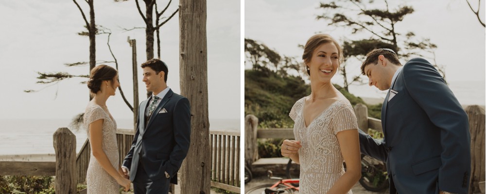 Destination beach wedding with bride in a beaded dress and groom in a blue suit.