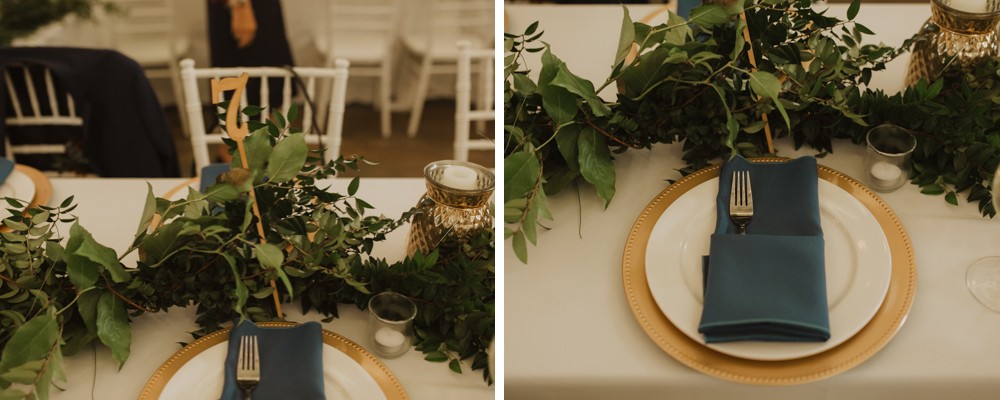 Gold and navy with greenery wedding reception inspiration. 