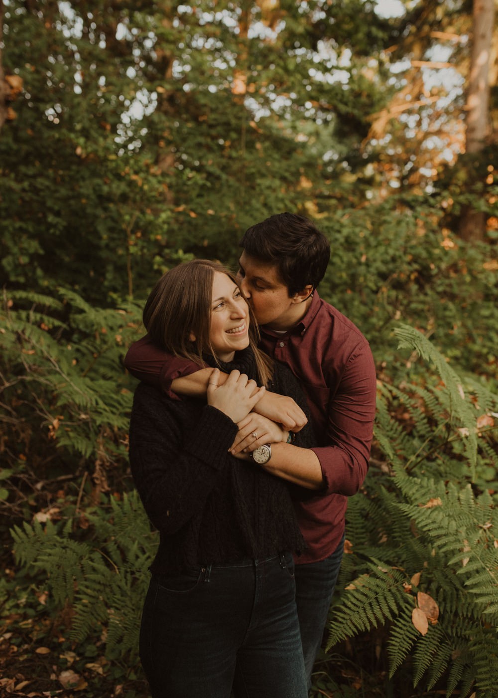 Same sex engagement session with bride in a free people sweater. 