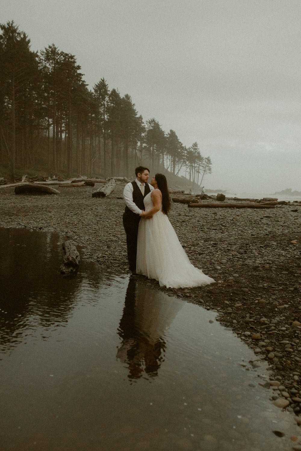 Stormy, foggy elopement at Ruby Beach on the Olympic Peninsula. 