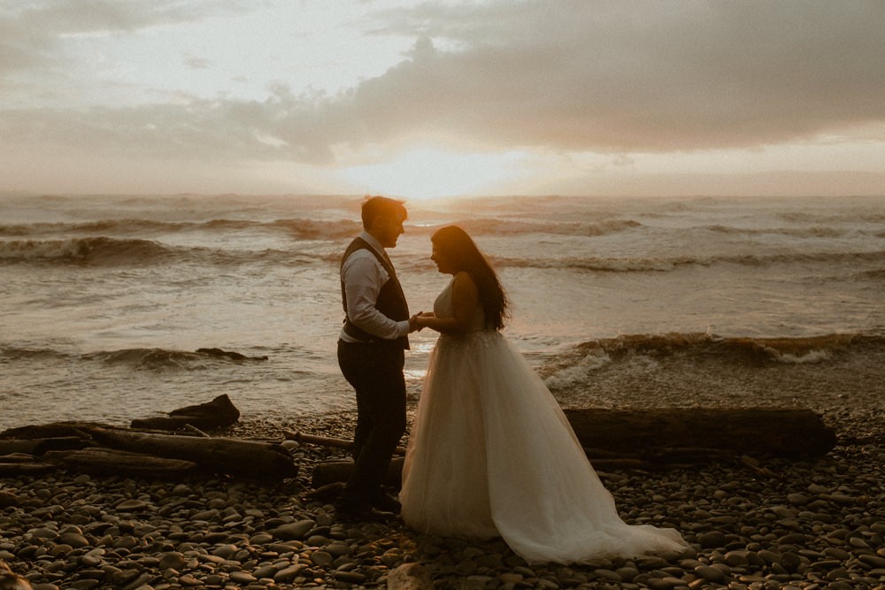 Colorful sunset elopement at Ruby Beach in Washington state. 