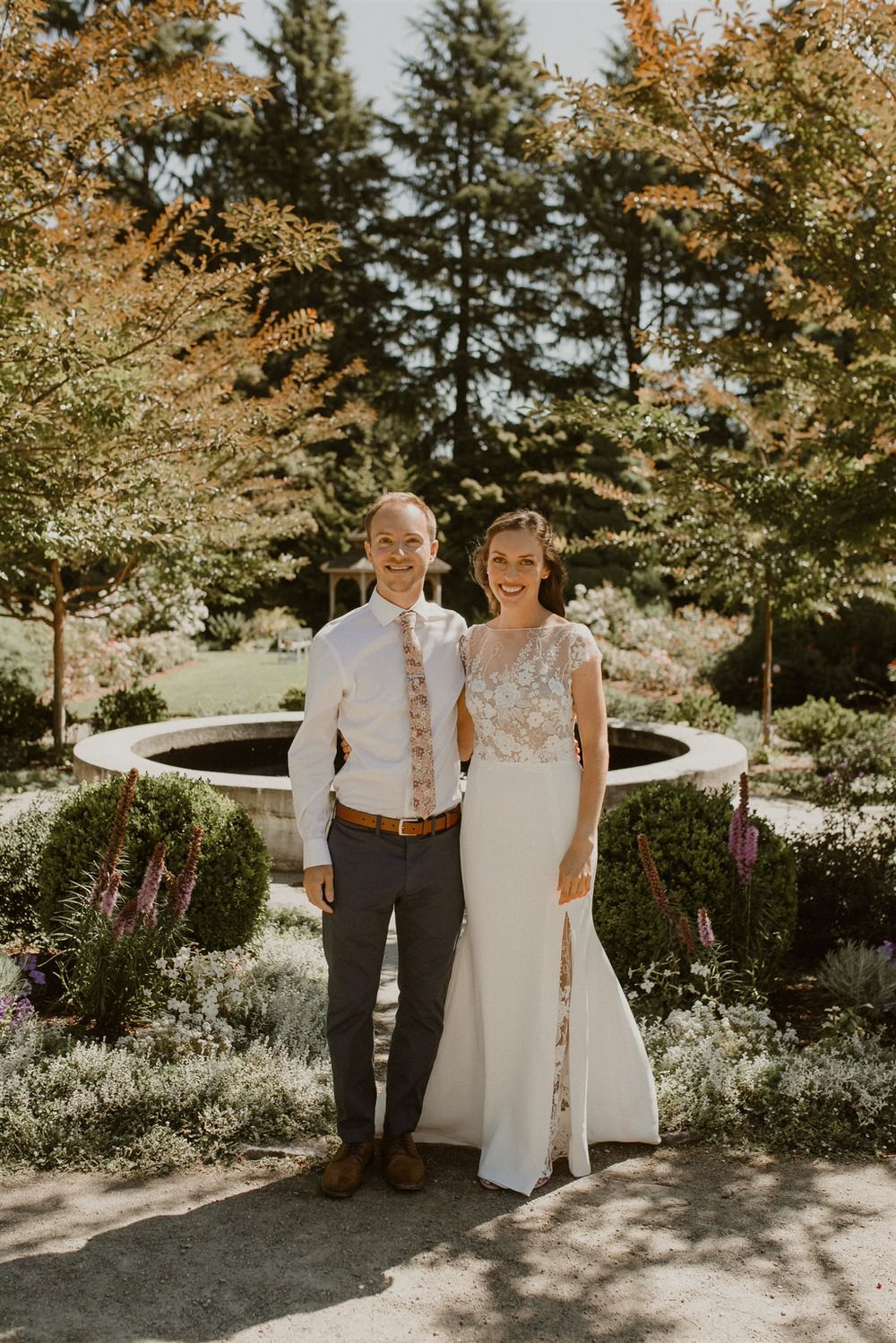 Summer morning wedding ceremony at Woodland Park Rose Garden in Seattle. 