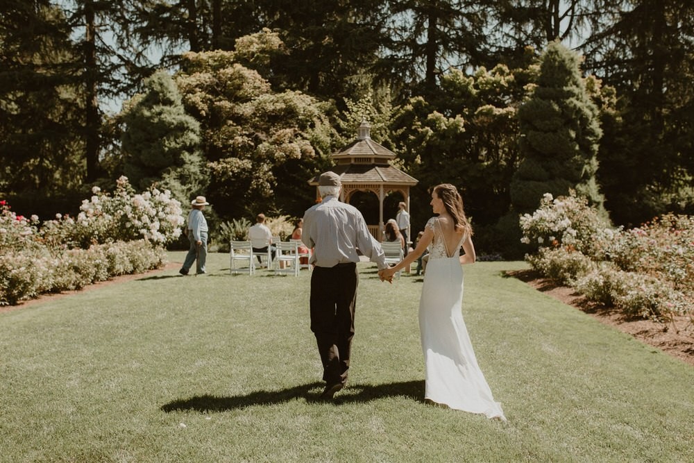 Socially-distanced wedding ceremony at Woodland Park Rose Garden. 