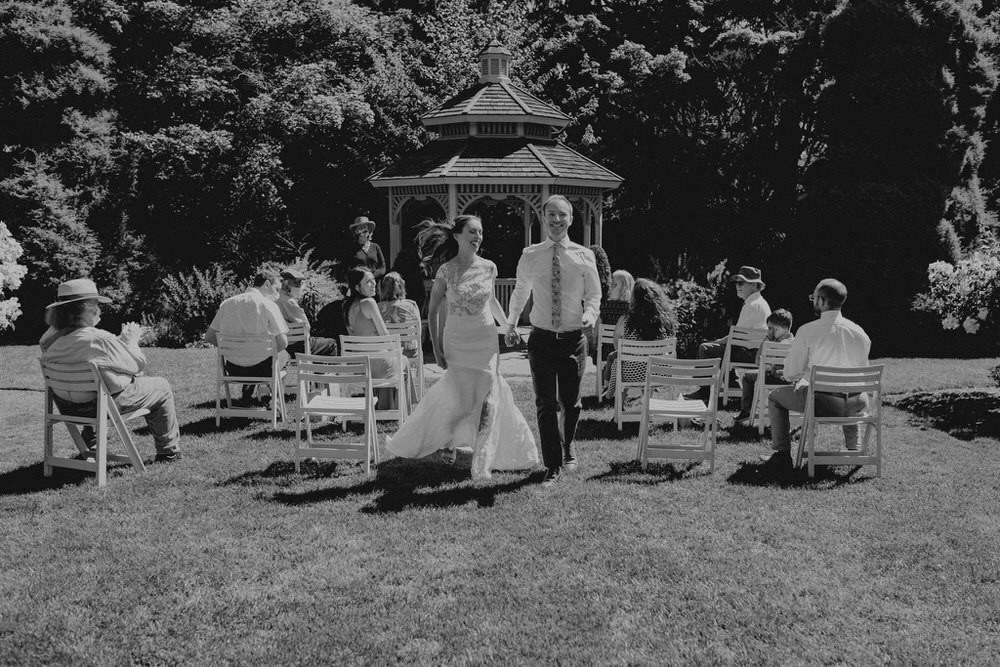 Summer morning wedding at Woodland Park Zoo Rose Garden. 