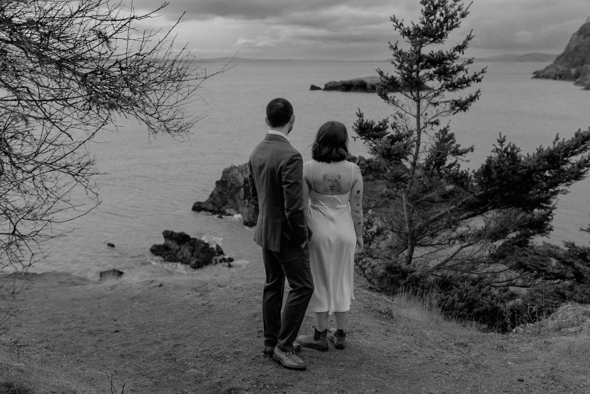 PNW adventure elopement inspiration with couple overlooking the Puget Sound on their wedding day.